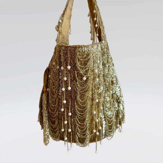 Bolso-Jasmin-Dorado-My-Indian-Storiesâ€”bolso-de-mano-elegante-en-tono-dorado-con-diseÃ±o-artesanalâ€”detalles-exclusivos-que-combinan-con-cualquier-look
